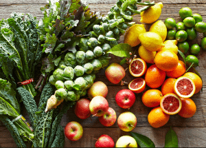 a group of fruits and vegetables on a wood surface Healthy Weight Loss Diets Northolt